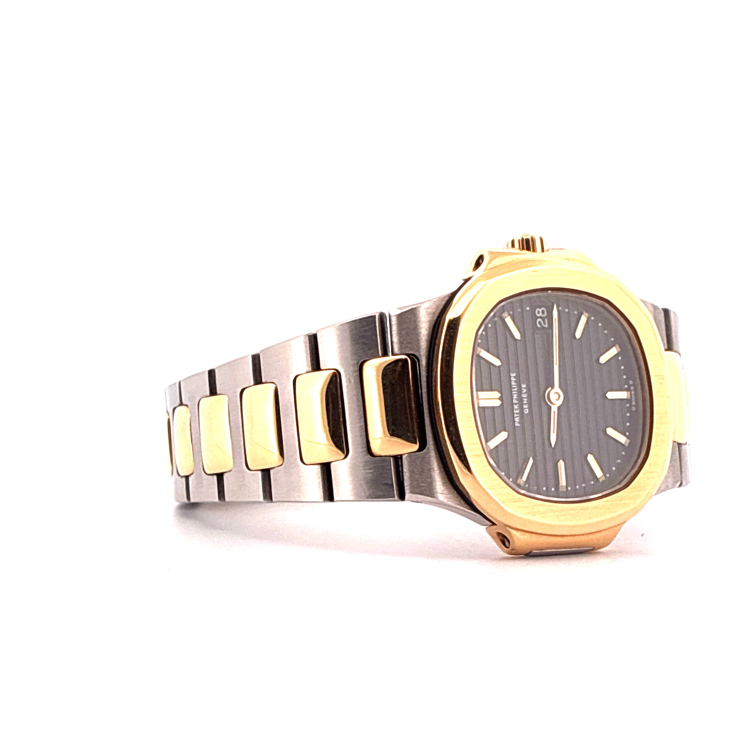 Nautilus / very rare / Sigma dial / Bicolor / Papers / 1986