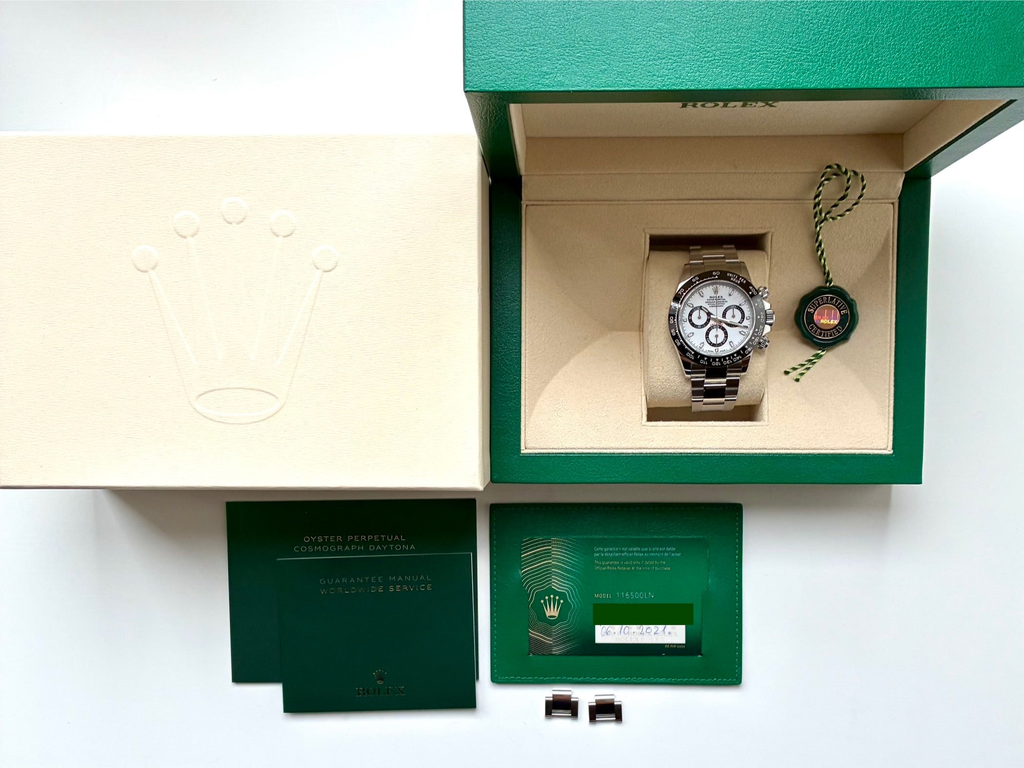 Rolex Daytona Panda-Dial 2021 Edelstahl-Automatik mit weißem Zifferblatt und Zubehör im grünen Karton