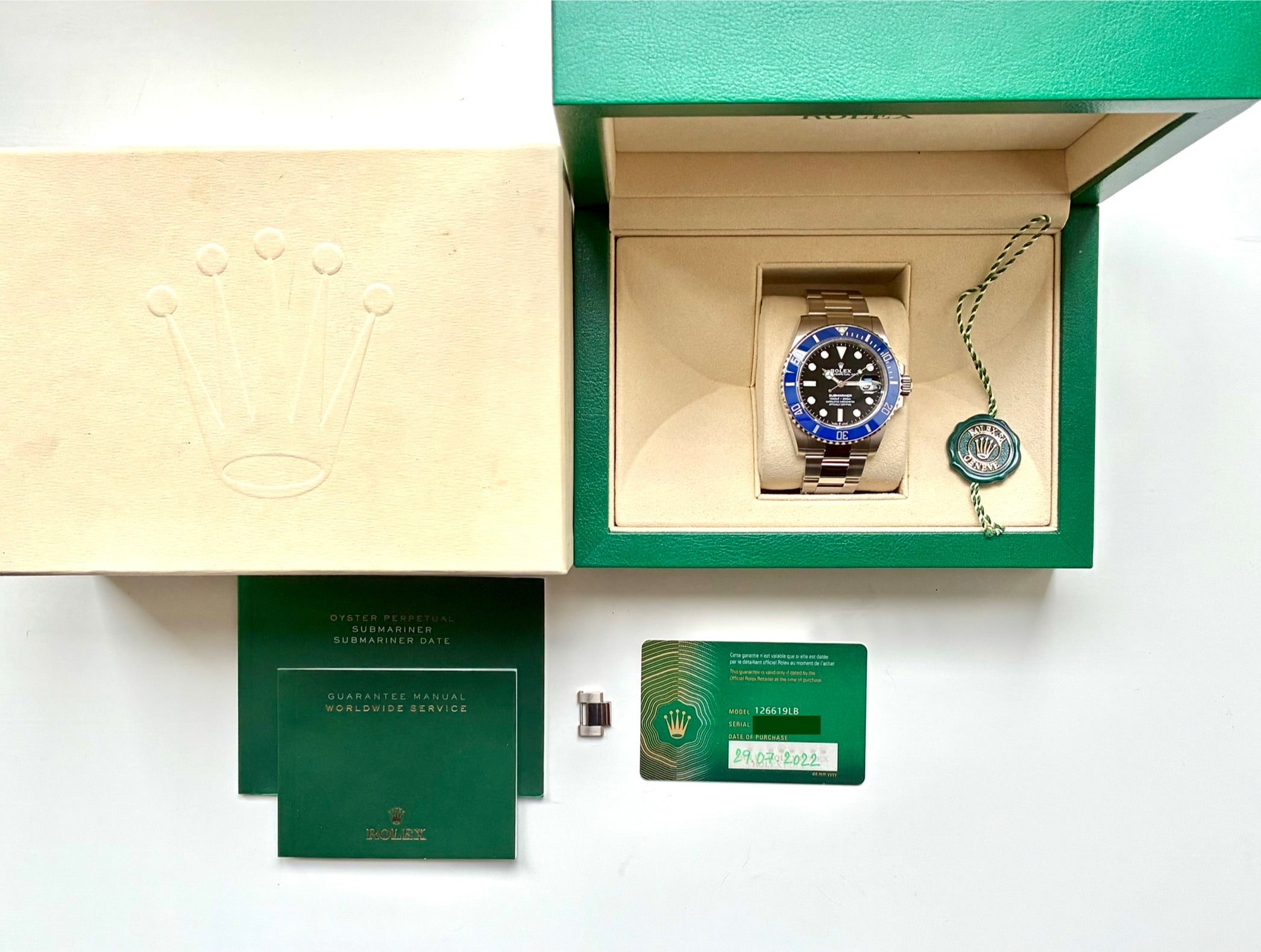 Rolex Submariner Date "Blueberry" in Stahl, Baujahr 2022, mit Zubehör und Garantiekarten